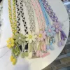 A fashionable, simple and elegant mobile phone lanyard with a large flower that is a bestseller in foreign trade details Picture